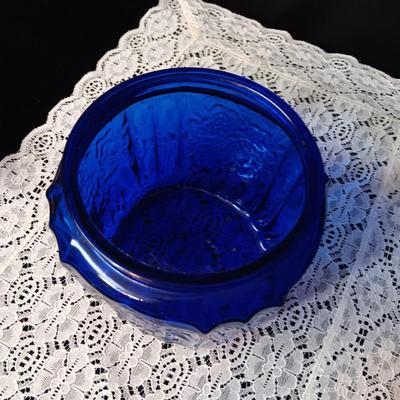 COBALT BLUE GLASS CANISTER W/LID, SMALL PITCHER AND 2 GLASS CUPS WITH RAISED BIRD DESIGN