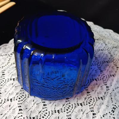 COBALT BLUE GLASS CANISTER W/LID, SMALL PITCHER AND 2 GLASS CUPS WITH RAISED BIRD DESIGN