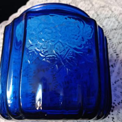 COBALT BLUE GLASS CANISTER W/LID, SMALL PITCHER AND 2 GLASS CUPS WITH RAISED BIRD DESIGN