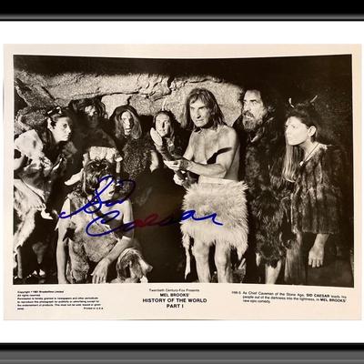 History of the World, Part I signed black and white movie still autographed by Sid Caesar. 8X10 Inches