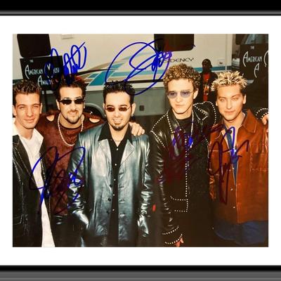 NSYNC signed photo autographed by Justin Timberlake, JC Chasez, Chris Kirkpatrick, Joey Fatone, and Lance Bass. 8X10 Inches