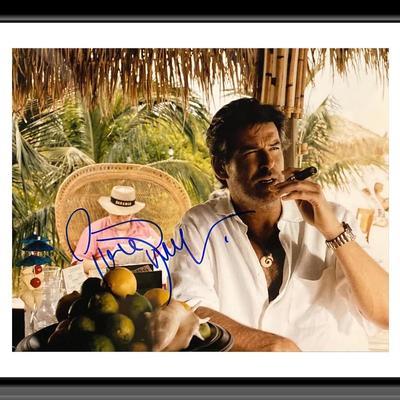 Pierce Brosnan signed  photo. 8X10 Inches