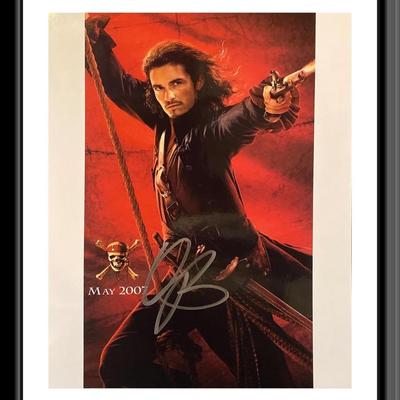 Pirates of the Caribbean signed movie photo autographed by Orlando Bloom. 8X10 Inches