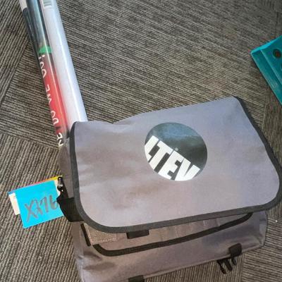 X276-bag with posters and T-shirts