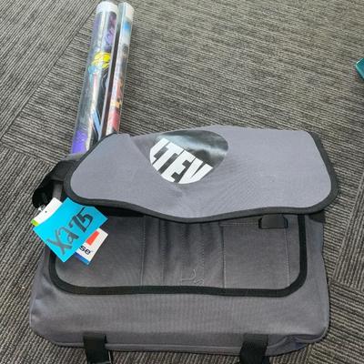 X275-bag with posters and T-shirts