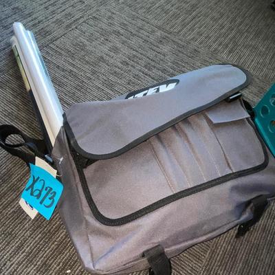 X273-bag with posters and T-shirts