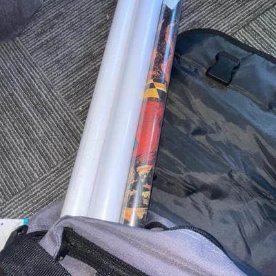 X271-bag with posters and T-shirts
