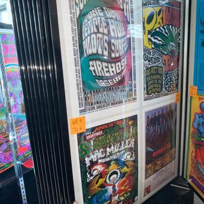 X232-Stack of band posters