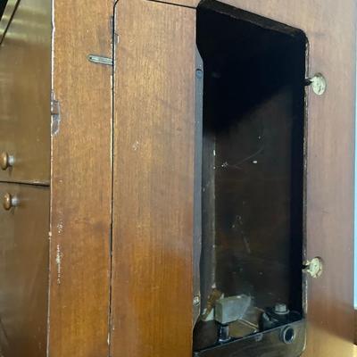 Vintage sewing machine cabinet
