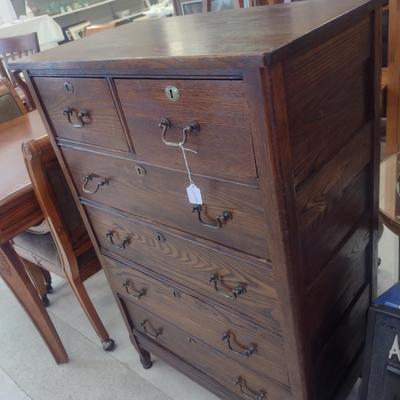 Sale Photo Thumbnail #1716: Antique Two Over Four Drawer Tall Dresser- Approx 30 1/2" X 17" x 47" Tall.  Key is present.  One drawer needs bottom to be secured.