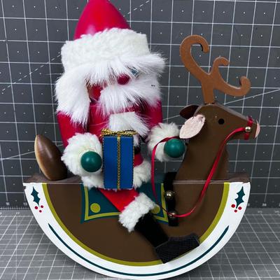 Santa Nut Cracker on a Reindeer Rocking Horse