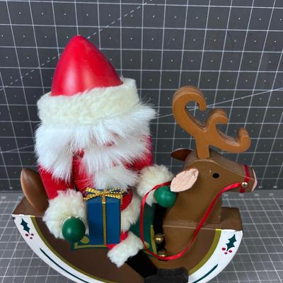 Santa Nut Cracker on a Reindeer Rocking Horse