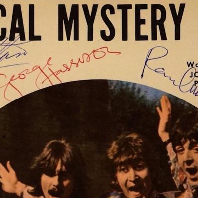 The Beatles signed music book