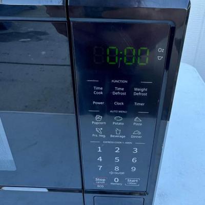 B - Midea 0.9 cu. ft. Countertop Microwave Oven