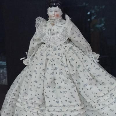 Sale Photo Thumbnail #10: Antique Porcelain Doll in Shadow Box- Approx 17 1/2" x 21" x 2 3/4"