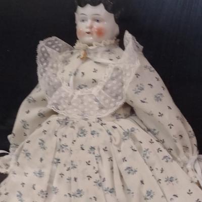 Antique Porcelain Doll in Shadow Box- Approx 17 1/2" x 21" x 2 3/4"