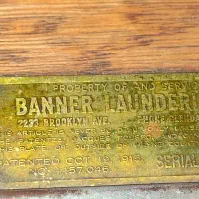 Sale Photo Thumbnail #2061: Antique Banner Laundering Company Oak Towel Rack with Laundry Bin.  Item was from old Tigers Stadium (Detroit, Michigan) locker room per owner.