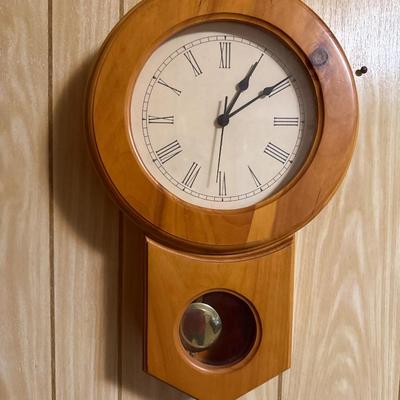 Pendulum wood wall clock