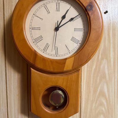 Pendulum wood wall clock