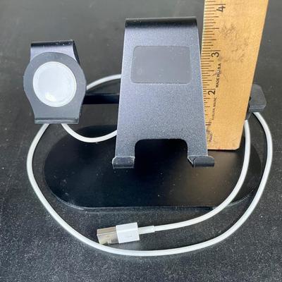 Sale Photo Thumbnail #405: 3-in-1 Electronics Station Compatible w/ iPhone 16, 15, 14, 13 & 12, iWatch Series, AirPods - Black Aluminum Stand Dock for bedside table or desk.  Includes magnetic iWatch charger with USB connector, one photo shows what the stand looks like with a phone