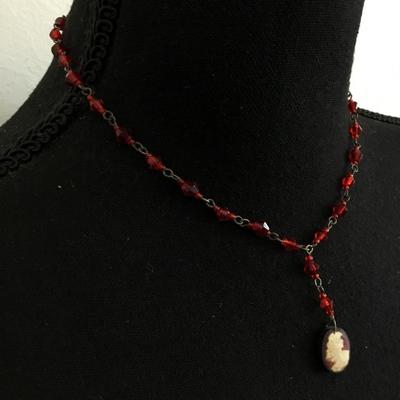 Vintage art, deco, crystal red beaded, and cameo pendant necklace