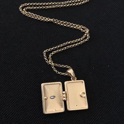 Sunburst locket necklace