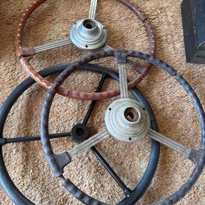 3 vintage car steering wheels