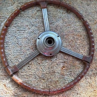 3 vintage car steering wheels