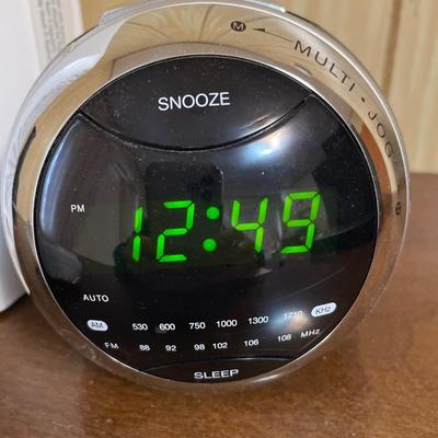 Clock, fan, outlet and flashlight
