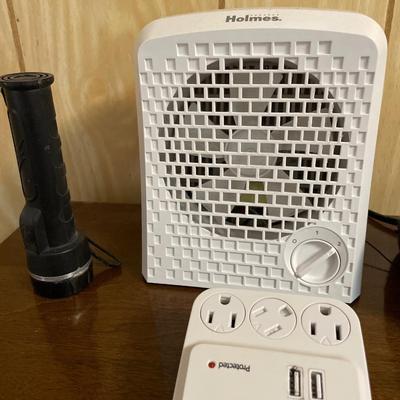 Clock, fan, outlet and flashlight