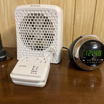 Clock, fan, outlet and flashlight