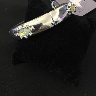 Jennifer Lopez, silver toned stretch bracelet