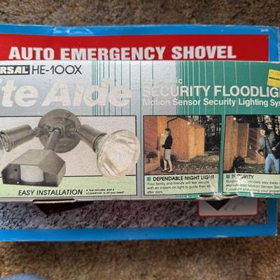 Security light and small snow shovel