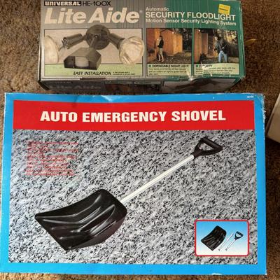 Security light and small snow shovel