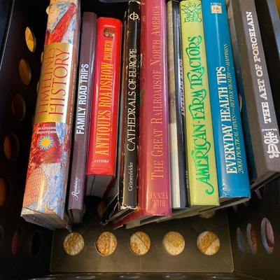 Black crate with hard cover books