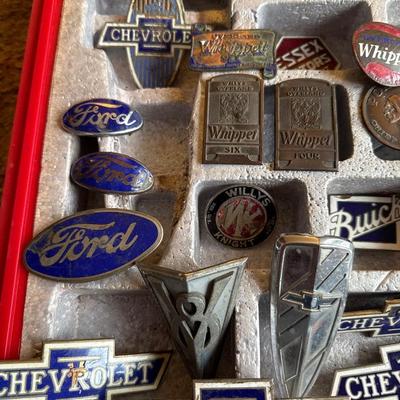 Vintage radiator vehicle emblems with case