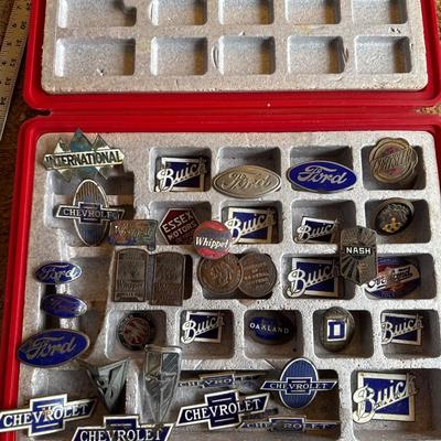 Vintage radiator vehicle emblems with case