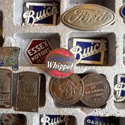 Vintage radiator vehicle emblems with case