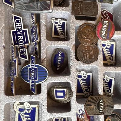 Vintage radiator vehicle emblems with case