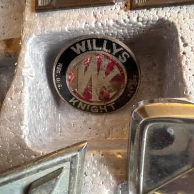 Vintage radiator vehicle emblems with case