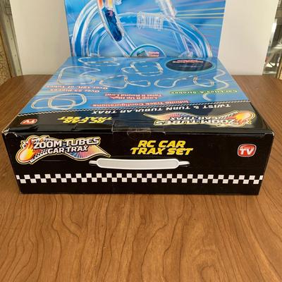 LOT 28 B: 3 NIP Zoom Tubes Car Trax RC Car Trax Set
