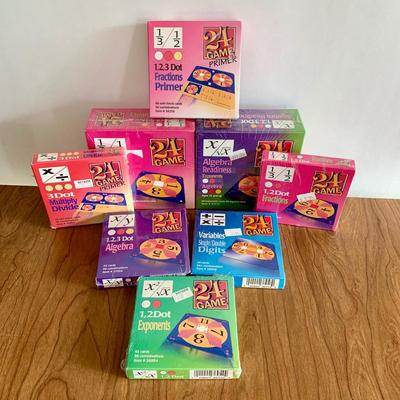 LOT 29 A: 8 NIP Suntex International 24 Game; Exponents, Variables, Algebra, Multiply / Divide, & Fractions