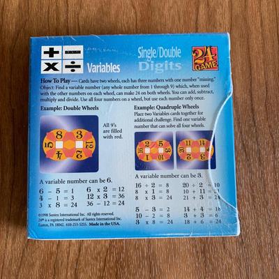LOT 29 A: 8 NIP Suntex International 24 Game; Exponents, Variables, Algebra, Multiply / Divide, & Fractions
