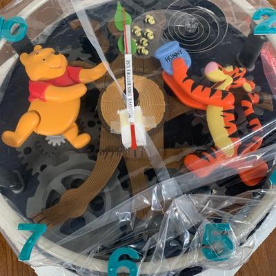 LOT 36 A: NIP Disney's Winnie The Pooh; Pooh & Friends Animated Musical Wall Clock w/ Remote Controller