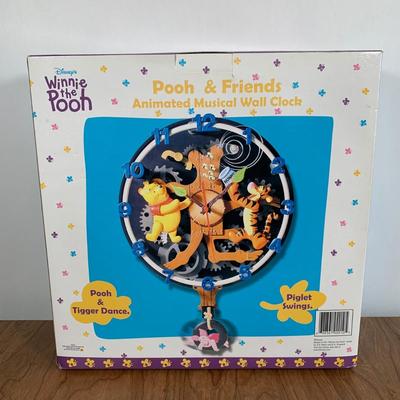 LOT 36 A: NIP Disney's Winnie The Pooh; Pooh & Friends Animated Musical Wall Clock w/ Remote Controller