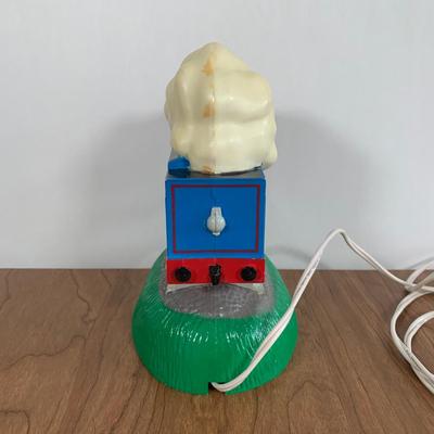 LOT 40 A: Thomas The Tank Engine Collection; Teaching Talking Clock, Happiness Express Portable Lamp, VHS's, DVD, Curtains, Flat...