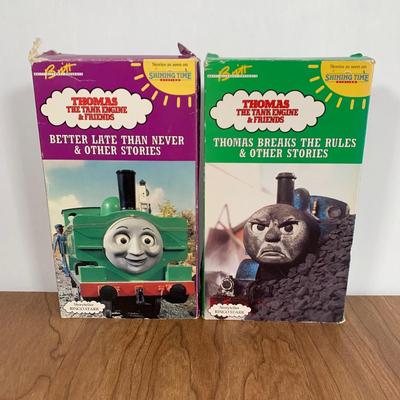 LOT 40 A: Thomas The Tank Engine Collection; Teaching Talking Clock, Happiness Express Portable Lamp, VHS's, DVD, Curtains, Flat...