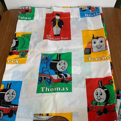 LOT 40 A: Thomas The Tank Engine Collection; Teaching Talking Clock, Happiness Express Portable Lamp, VHS's, DVD, Curtains, Flat...