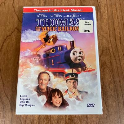 LOT 40 A: Thomas The Tank Engine Collection; Teaching Talking Clock, Happiness Express Portable Lamp, VHS's, DVD, Curtains, Flat...