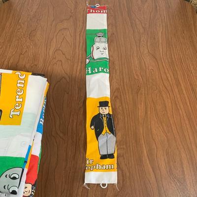 LOT 40 A: Thomas The Tank Engine Collection; Teaching Talking Clock, Happiness Express Portable Lamp, VHS's, DVD, Curtains, Flat...